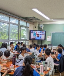 写真：区長の訪問の様子